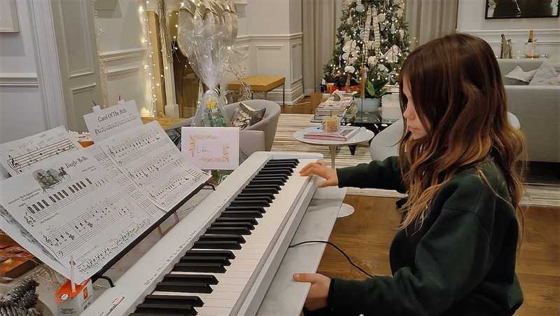 girl piano lesson christmas.jpg